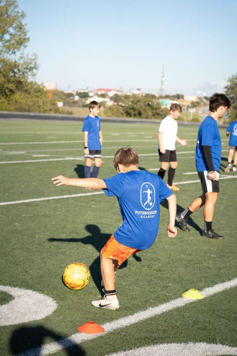 Player striking the ball during a drill